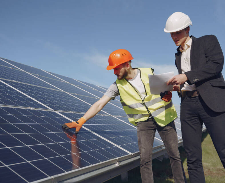 engineer checking solar panels